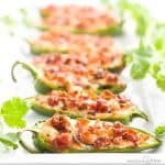 bacon cream cheese jalapeno poppers on a tray