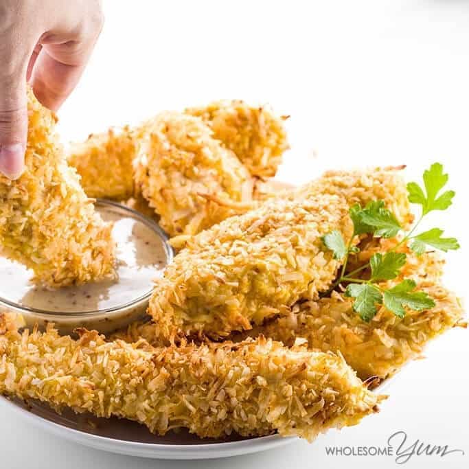Easy Baked Coconut Chicken Tenders Recipe - Paleo & Low Carb | Wholesome Yum | Easy healthy recipes. 10 ingredients or less.