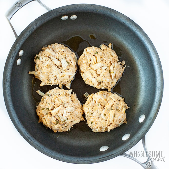 Uncooked Paleo Crab Cakes in a Pan Ready to Cook