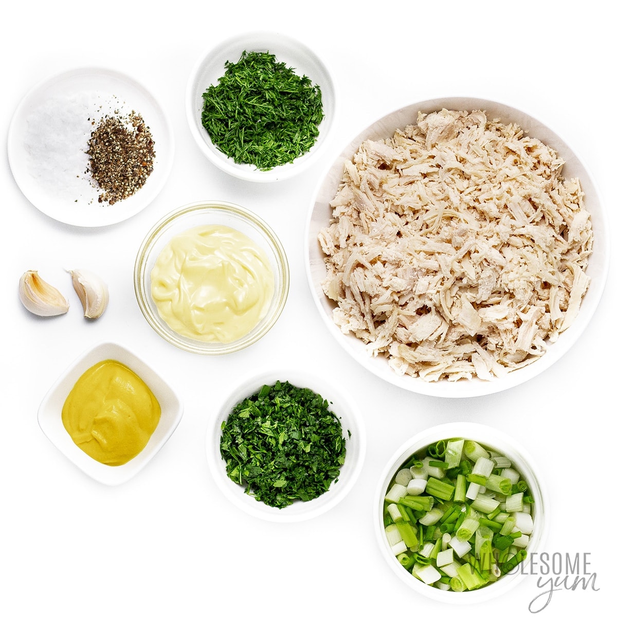 Low carb chicken salad ingredients in bowls.