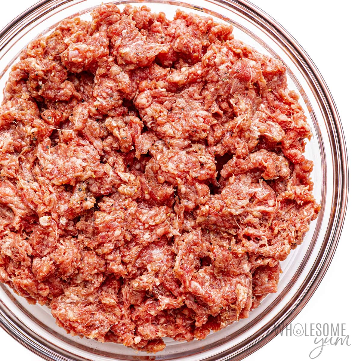 Raw ground beef in a bowl.