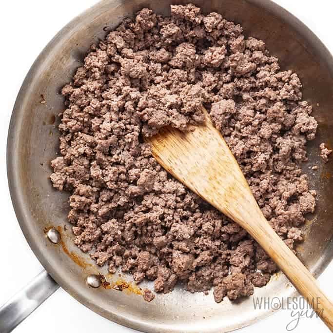 Browned ground beef in a frying pan