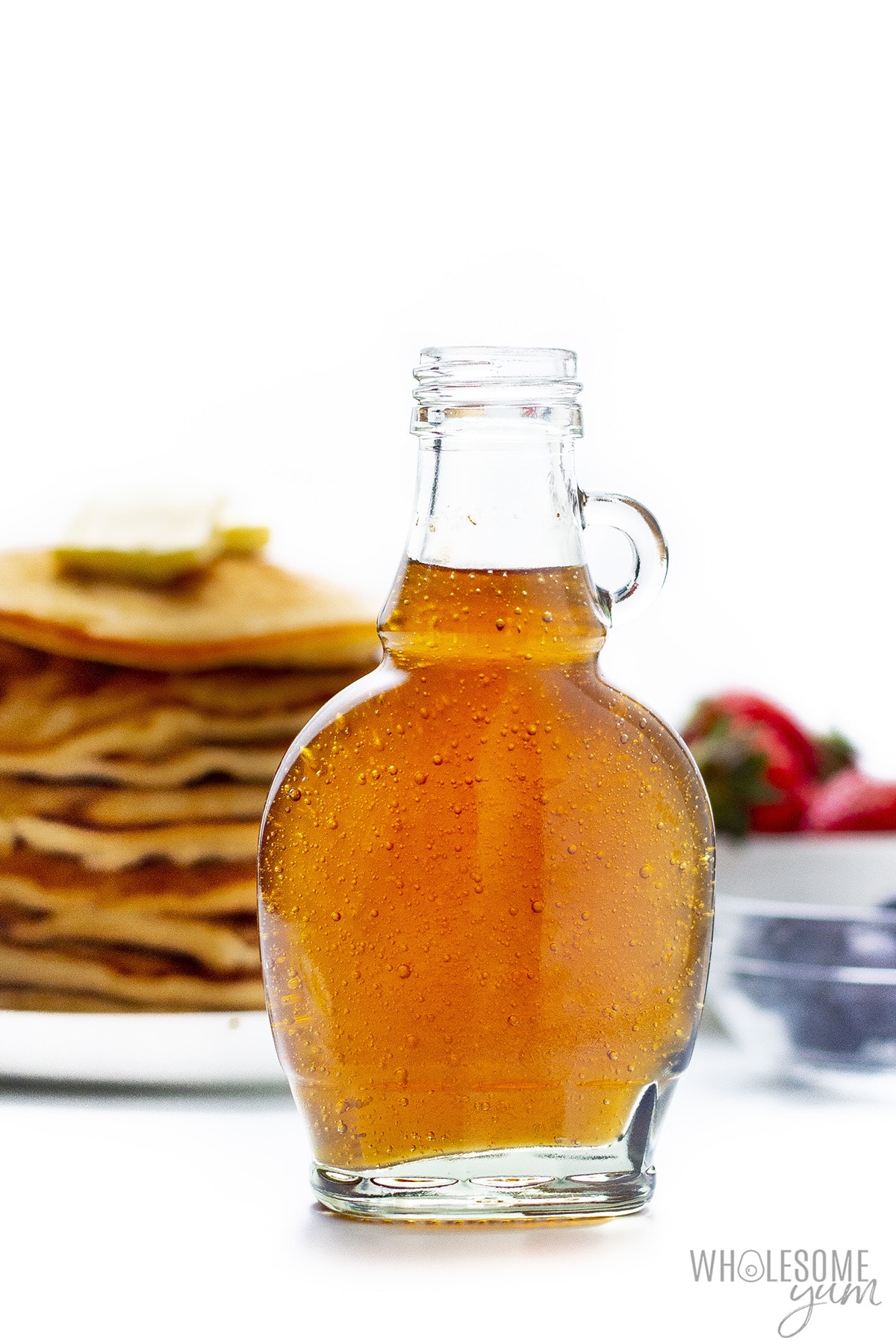Keto pancake syrup in a glass bottle.