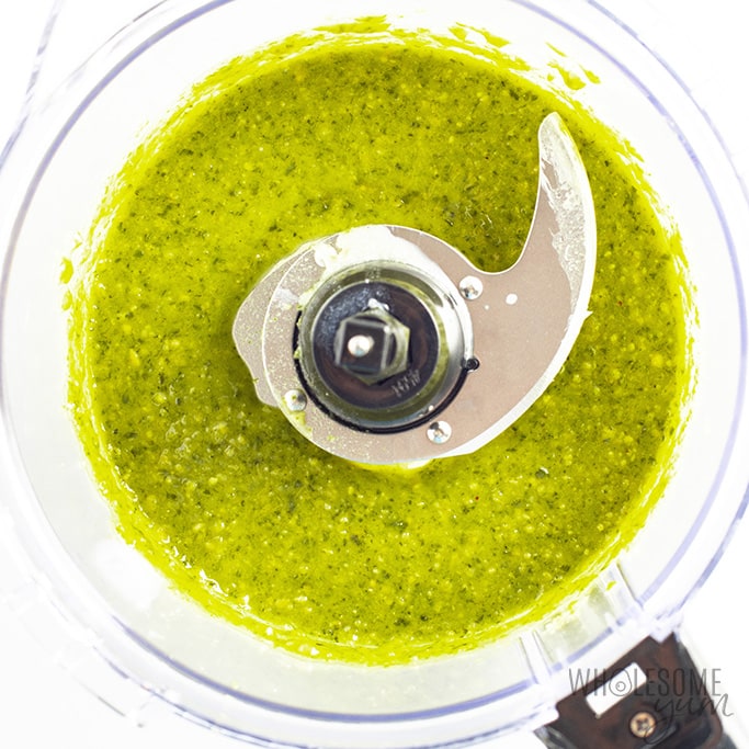 Basil pesto and butter in a food processor