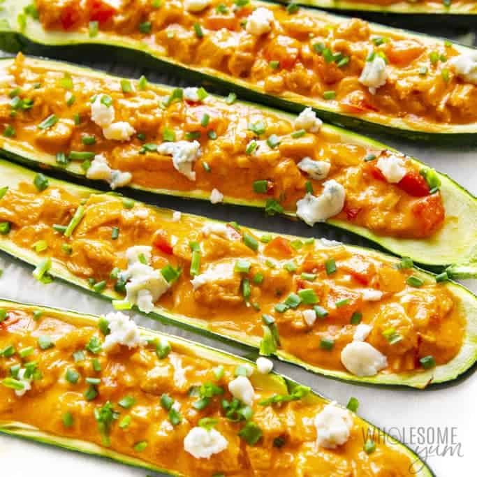 Baked buffalo stuffed zucchini boats with blue cheese and chives