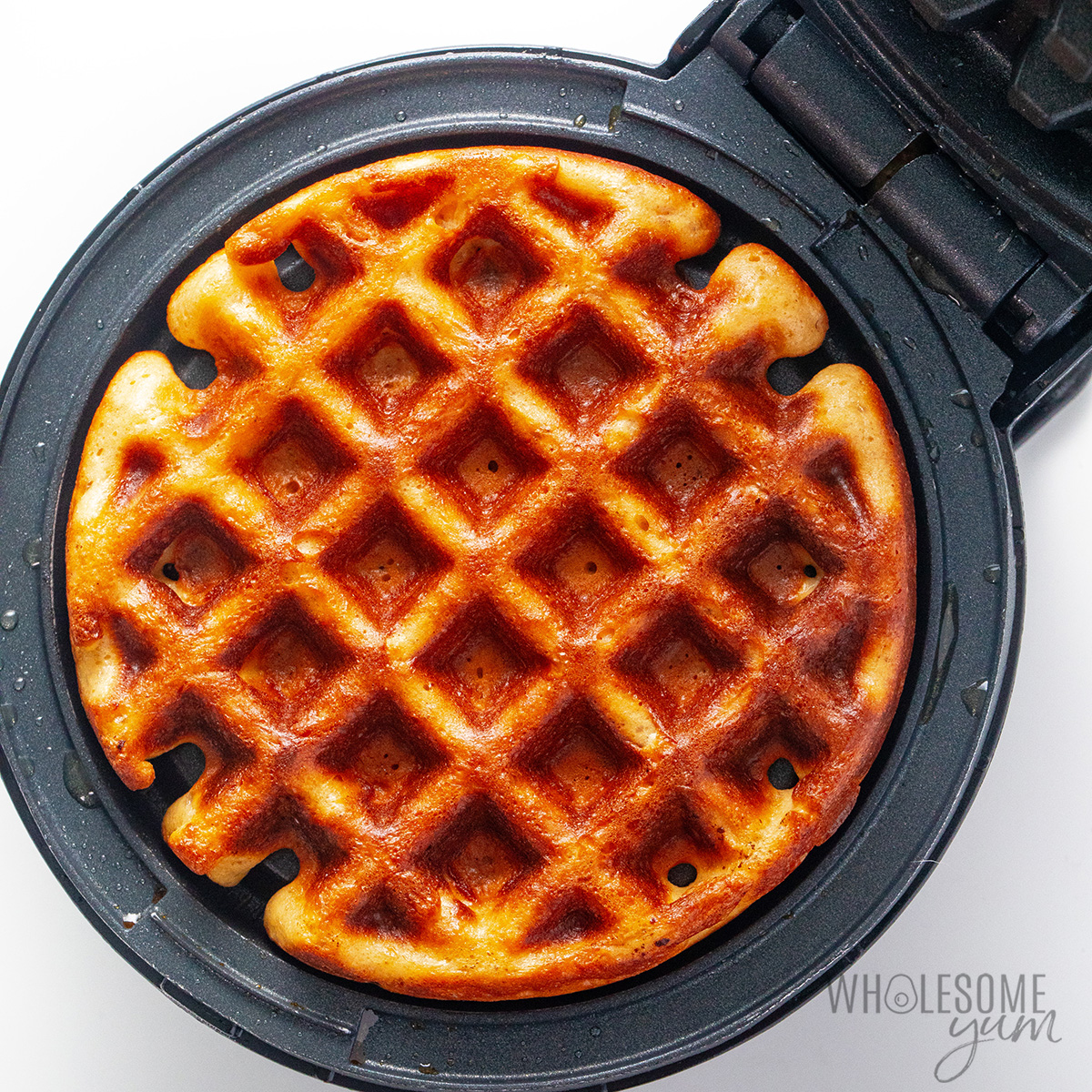 Crisp waffle in a waffle maker.