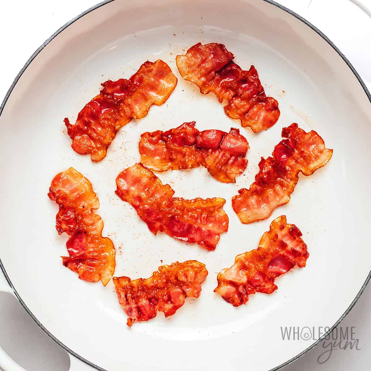 Cooked bacon in a skillet.
