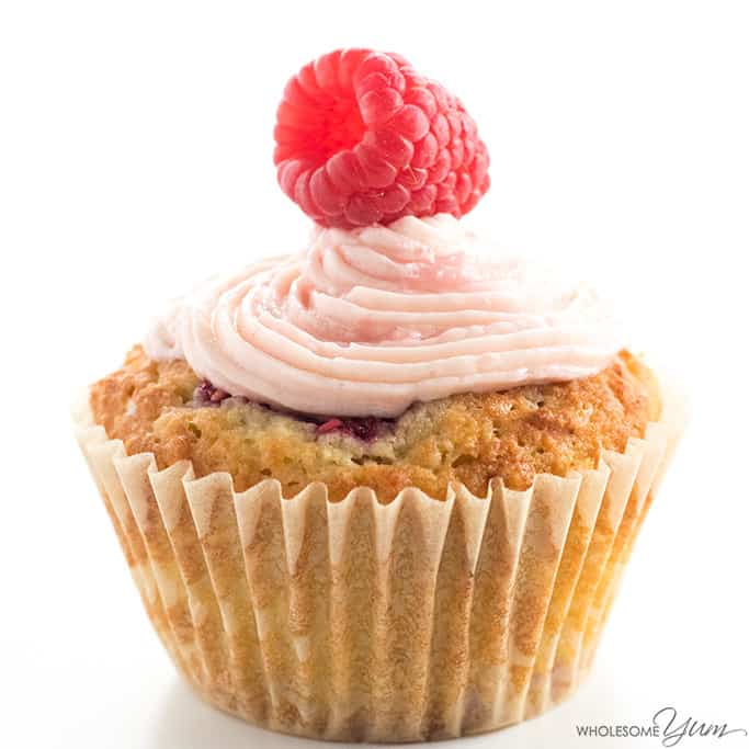 Sugar-free Cupcakes Recipe with Raspberry Frosting (Low Carb, Paleo) - These sugar-free cupcakes are bursting with juicy raspberries and topped with natural raspberry buttercream frosting. Low carb, gluten-free & paleo. Detail: sugar-free-frosted-raspberry-cupcakes-low-carb-paleo-img-6149