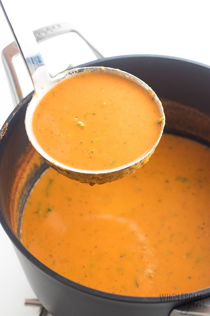Keto Low Carb Roasted Tomato Soup Recipe - This easy low carb tomato soup recipe is bursting with roasted tomatoes & fresh basil. Who knew keto roasted tomato soup could be so delicious? There's a paleo option, too.