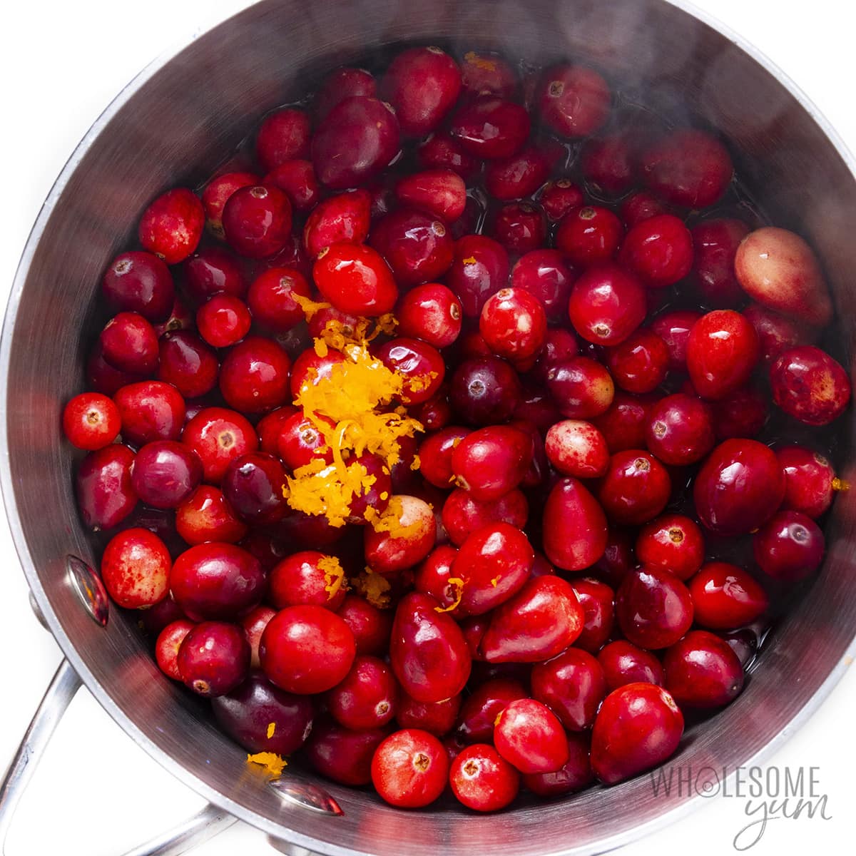 Sugar-free cranberry sauce ingredients in a saucepan.