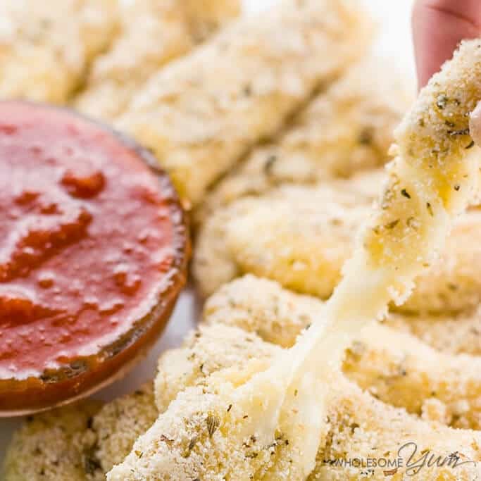 This gluten-free, low carb mozzarella sticks recipe is super easy made with just 6 ingredients. They make a healthy appetizer everyone will love!