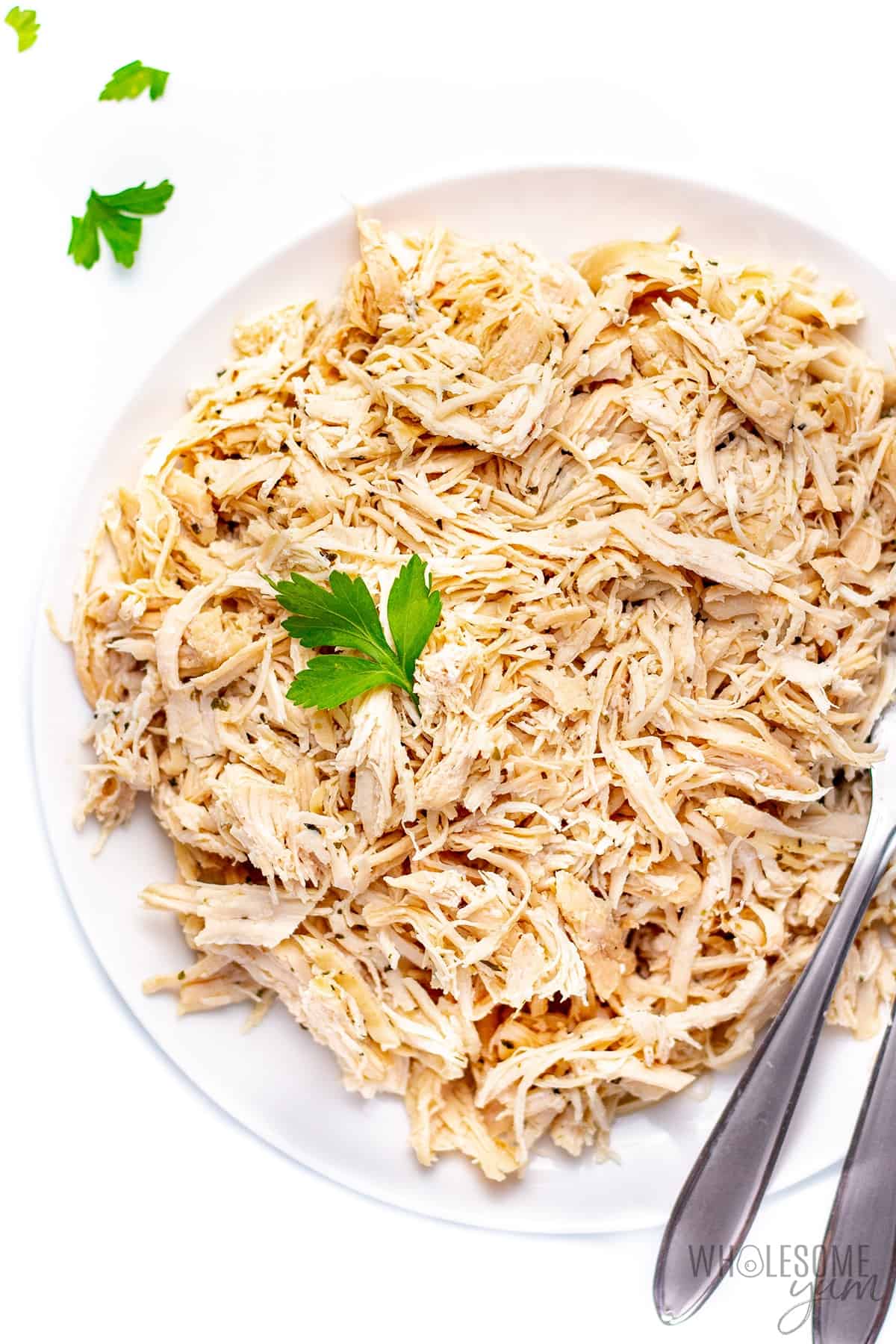 Shredded chicken breast on a plate.