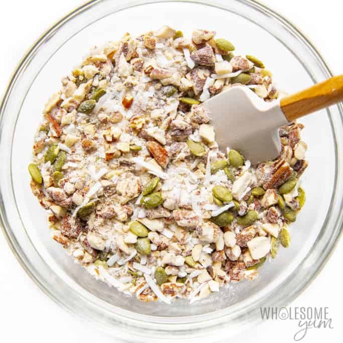 Dry ingredients for keto granola bars mixed in a bowl