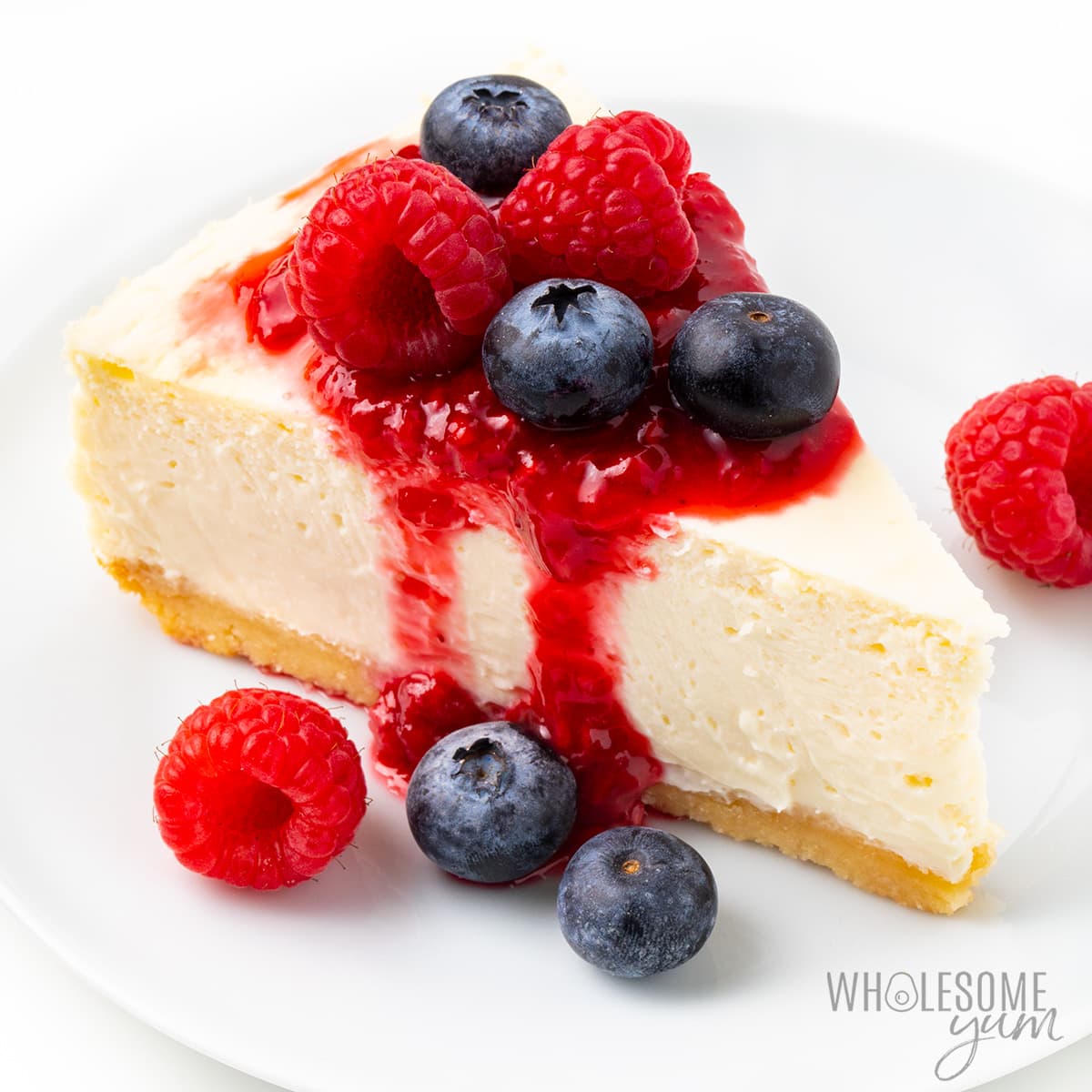 Keto Cheesecake Recipe (Low Carb Sugar-Free Cheesecake) - Wholesome Yum - Easy healthy recipes. 10 ingredients or less.