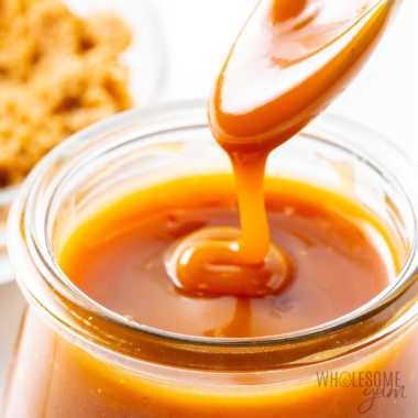 Sugar-free caramel syrup dripping off a spoon.