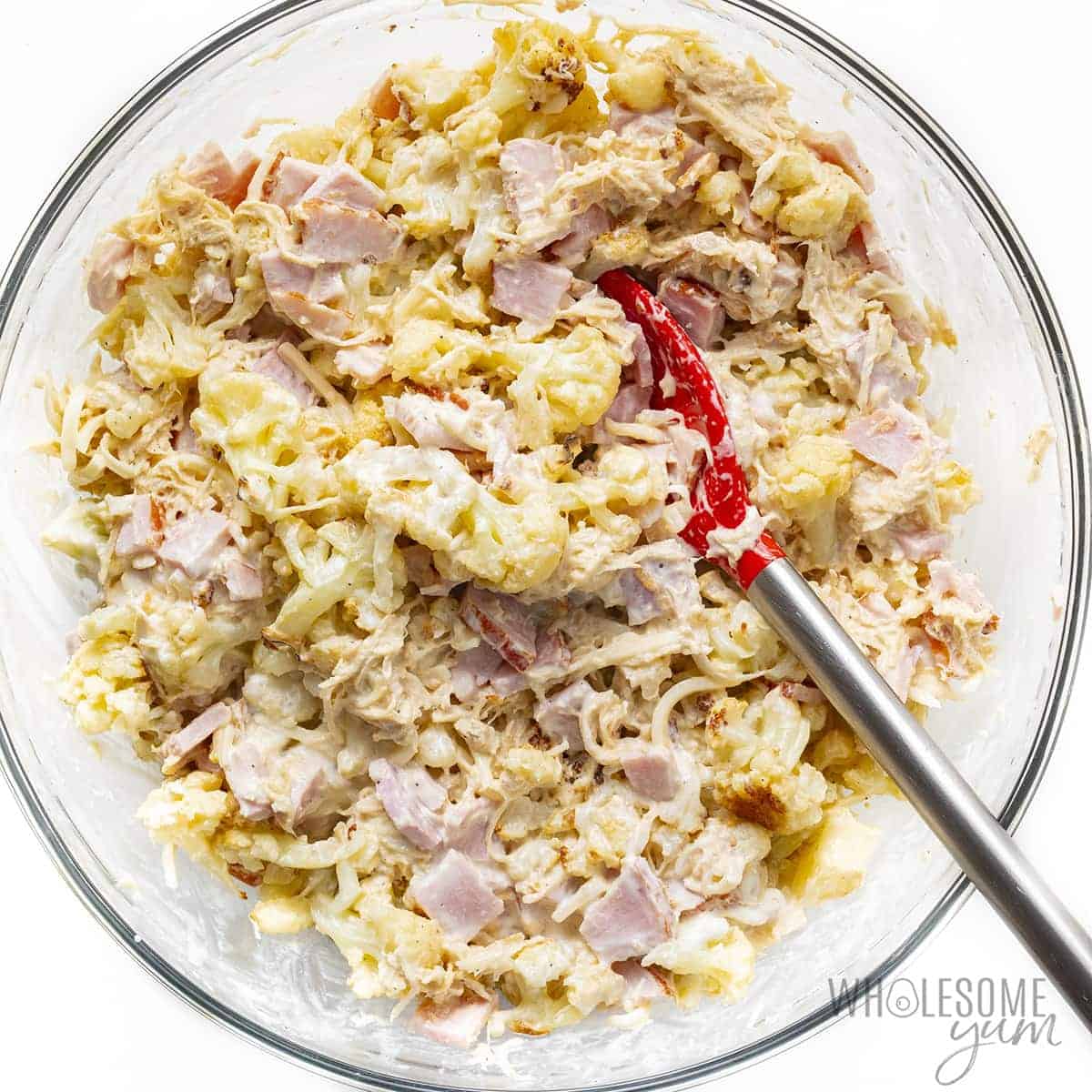 Cream base mixed with meat and cauliflower.