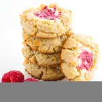 Cheesecake Cookies Recipe (Low Carb Raspberry Cheesecake Cookies) - These easy raspberry cheesecake thumbprint cookies are gluten-free, sugar-free & low carb. A cream cheese shortbread cookie with a raspberry swirl cheesecake center! Detail: cheesecake-cookies-recipe-low-carb-raspberry-cheesecake-cookies-img-5627