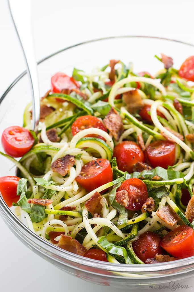 Zucchini Noodle Salad Recipe with Bacon & Tomatoes (Low Carb, Paleo) - This cold zucchini noodle salad recipe is a delicious, healthy way to enjoy raw spiralized zucchini noodles. Quick & easy with common ingredients!