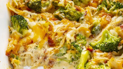 Chicken bacon ranch casserole in a baking dish with a section removed to show texture.