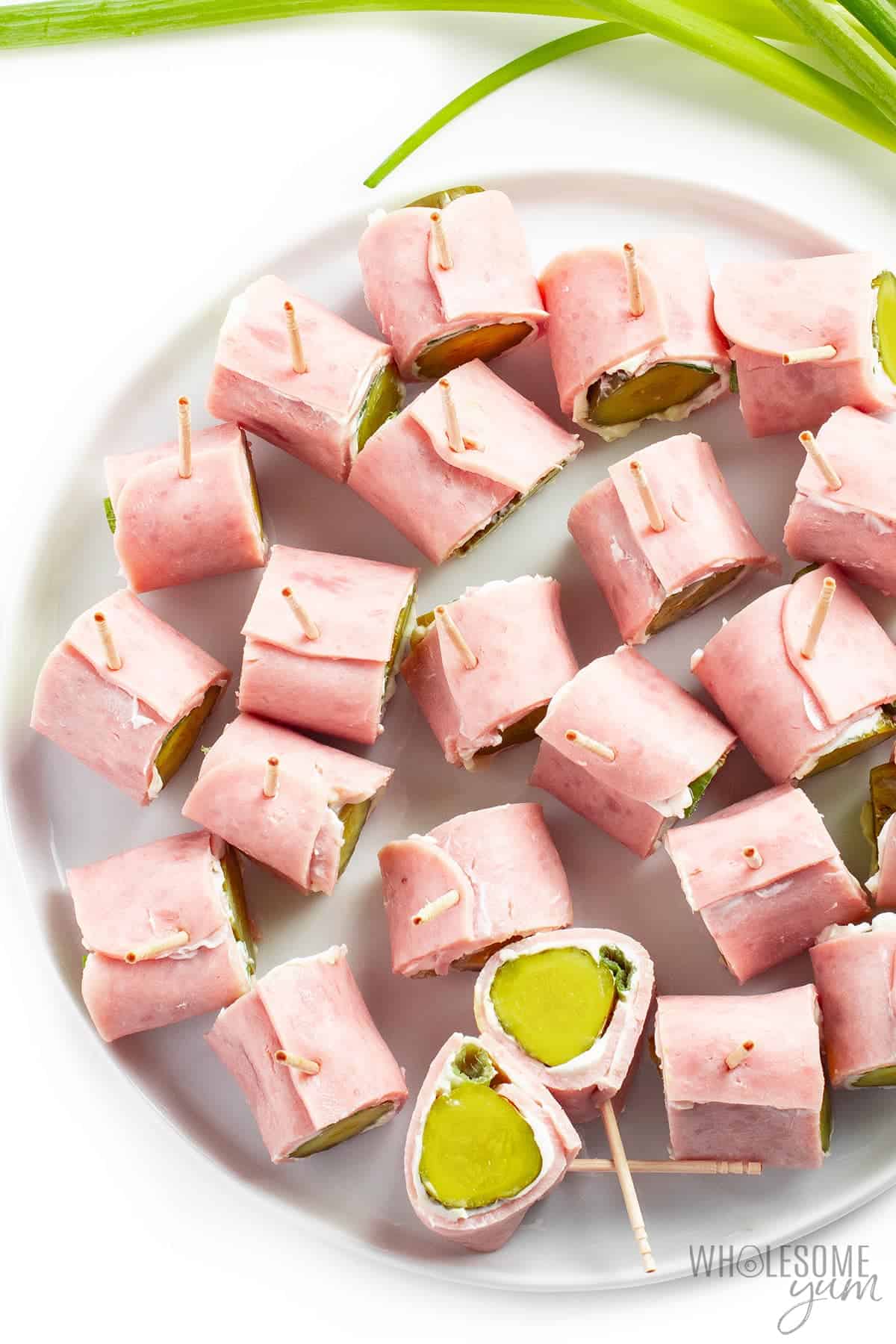 Ham cream cheese roll ups on a platter