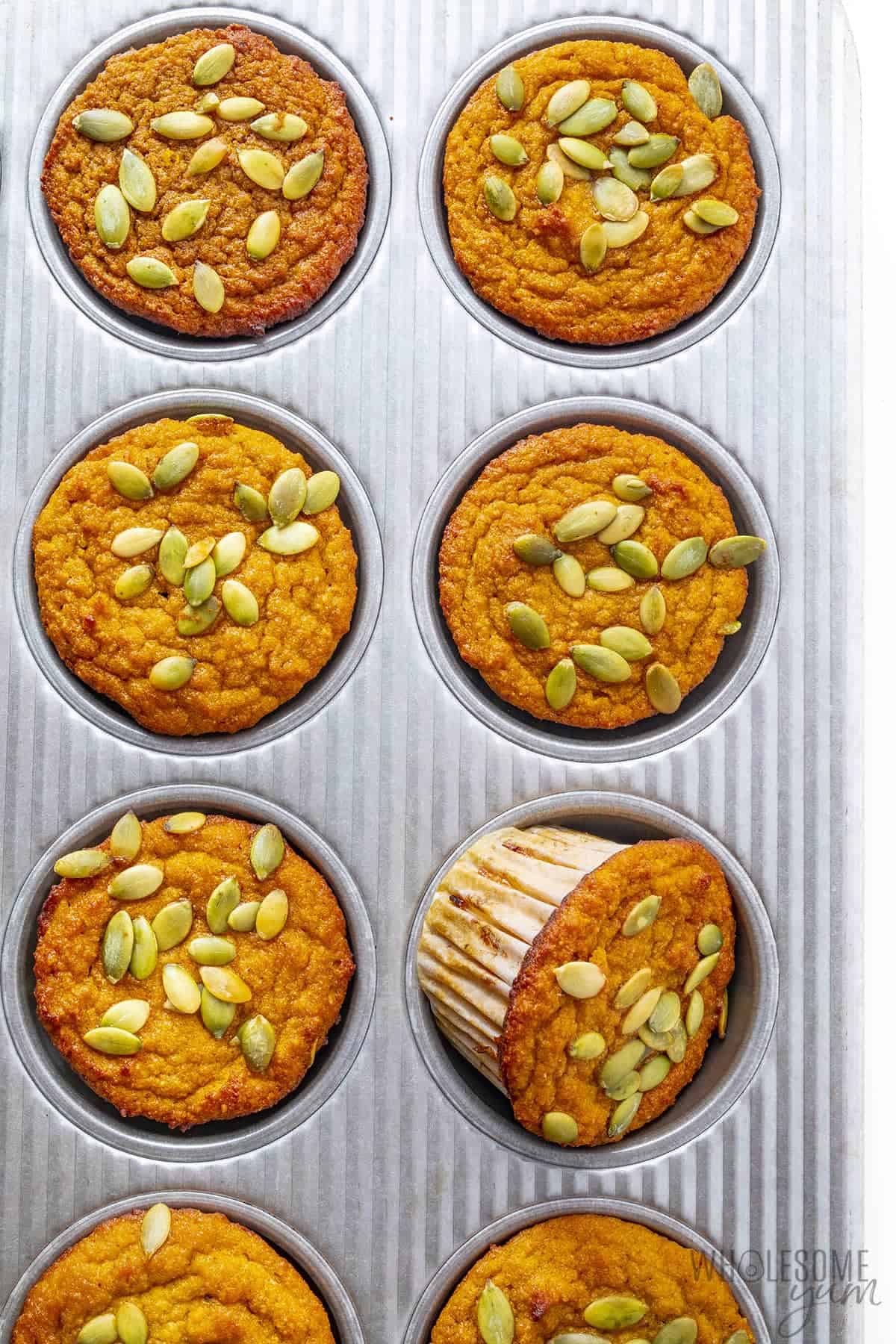 Almond flour pumpkin muffins in a muffin tin