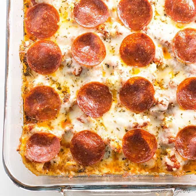 Keto Low Carb Pizza Casserole Recipe (Easy) - 5 Ingredients - This easy keto low carb pizza casserole recipe requires just 5 ingredients. Find out how to make a delicious cauliflower pizza casserole - no crust needed!