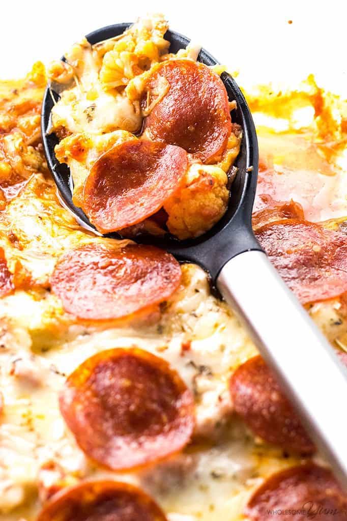 Keto Low Carb Pizza Casserole Recipe (Easy) - 5 Ingredients - This easy keto low carb pizza casserole recipe requires just 5 ingredients. Find out how to make a delicious cauliflower pizza casserole - no crust needed!