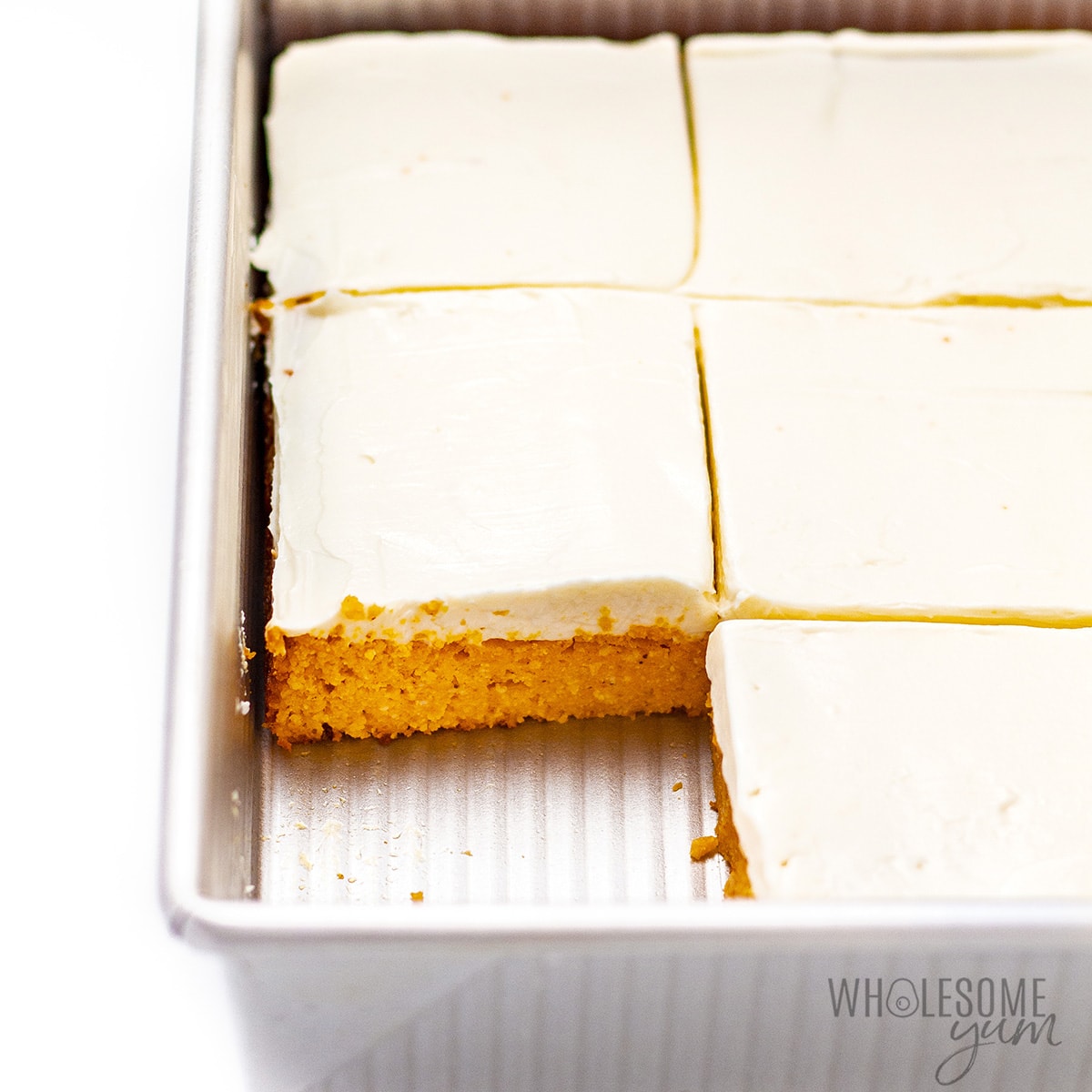 Finished pumpkin bars with cream cheese frosting.