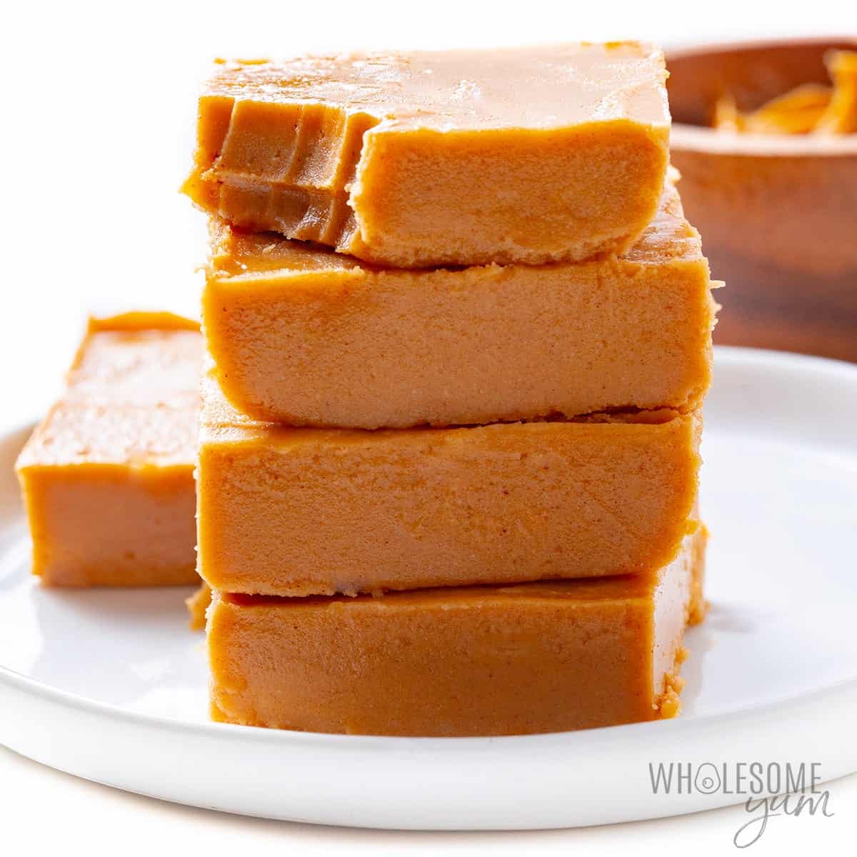 Keto peanut butter fudge stacked on a plate