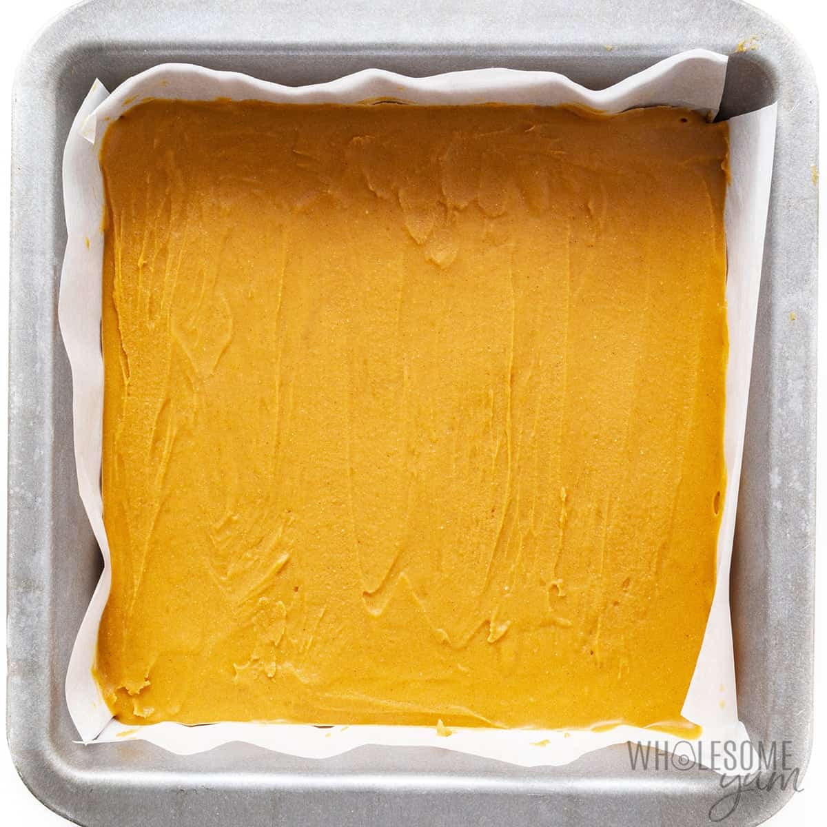 Keto peanut butter fudge frozen in pan