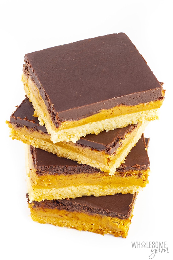 Stack of chocolate peanut butter bars cut into squares