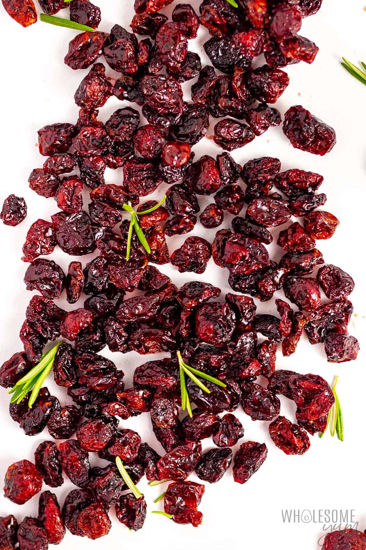 Dried cranberries without sugar spread on a white tabletop