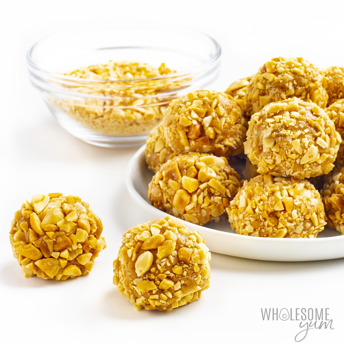Keto peanut butter protein balls piled on a plate