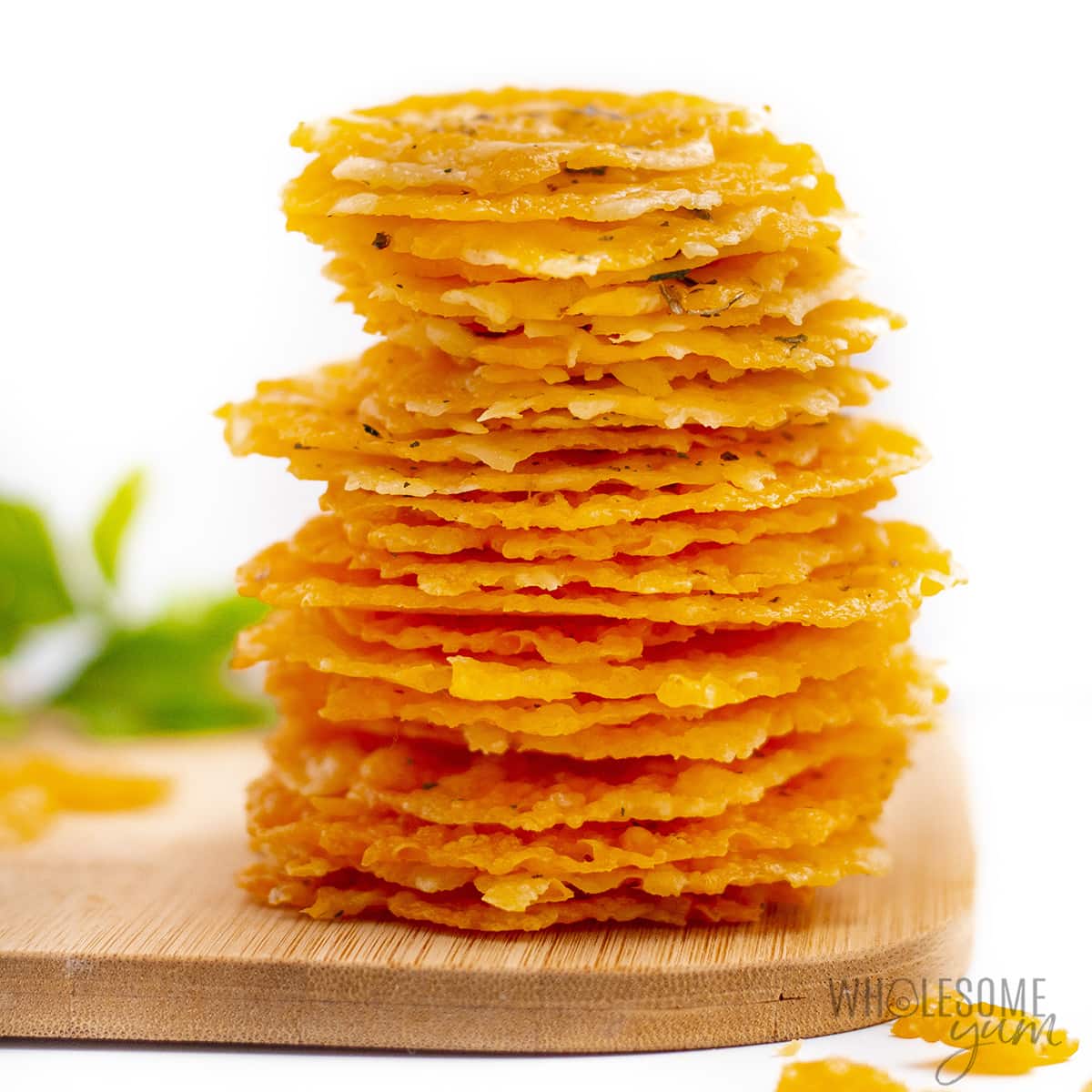 Baked cheese crisps (cheddar parmesan crisps) in a stack.