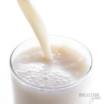 How to make almond milk-showing being poured into a glass