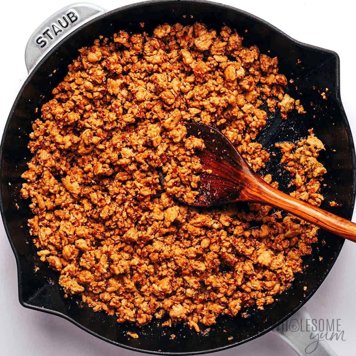 Cooked taco meat in a skillet.