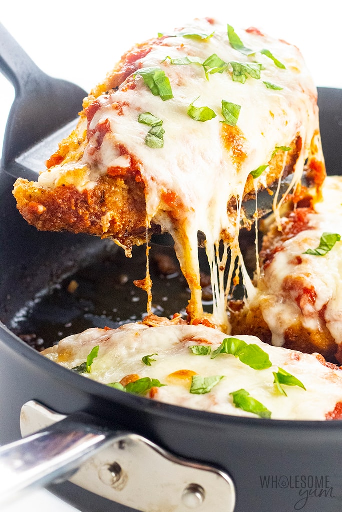 Cheese pull photo of keto chicken parm