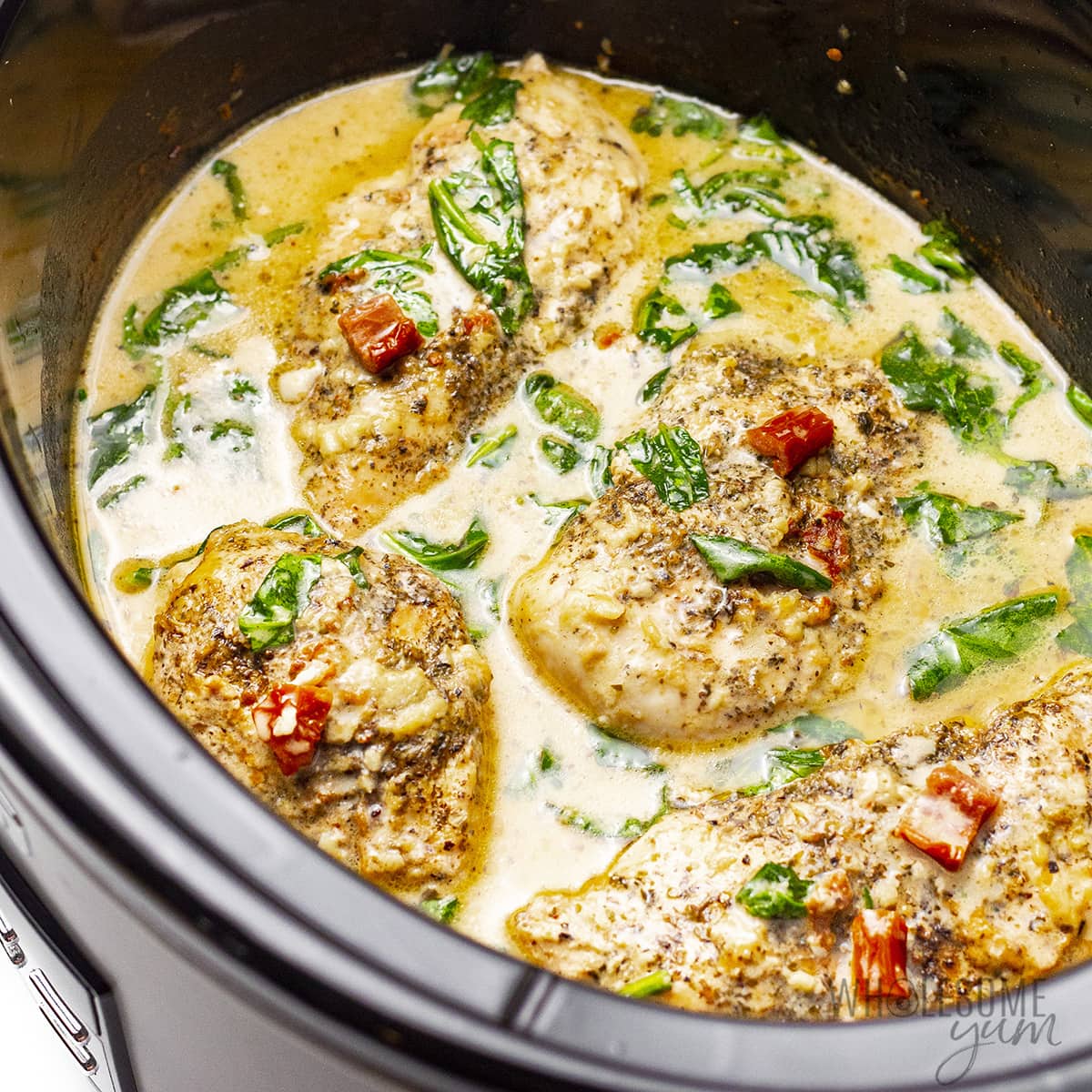 Tuscan garlic chicken in a Crock Pot.