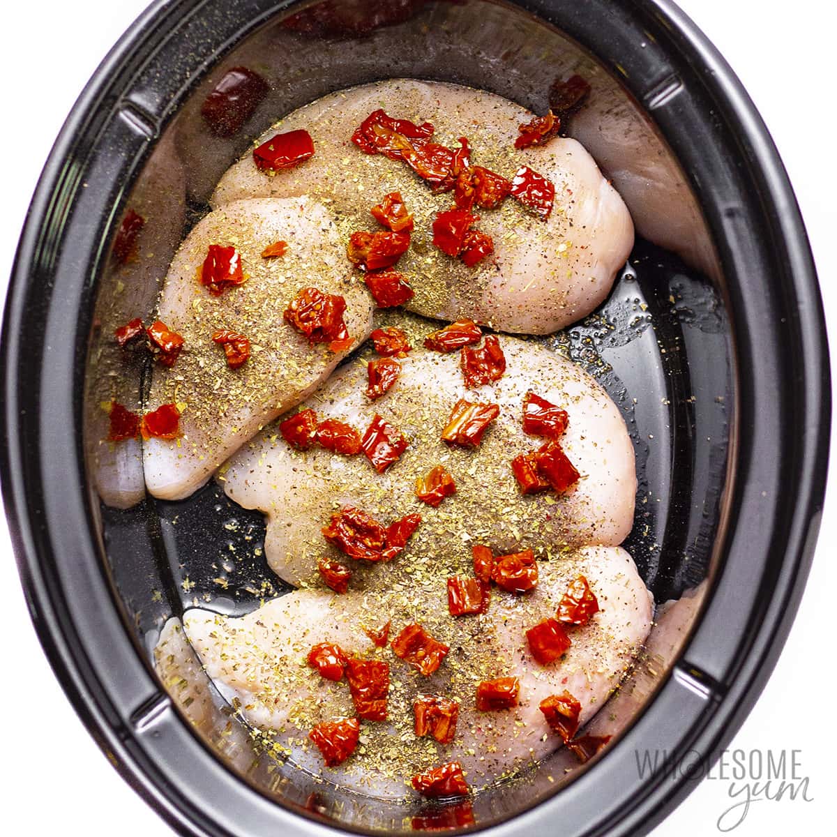Seasoned chicken topped with sun dried tomatoes.