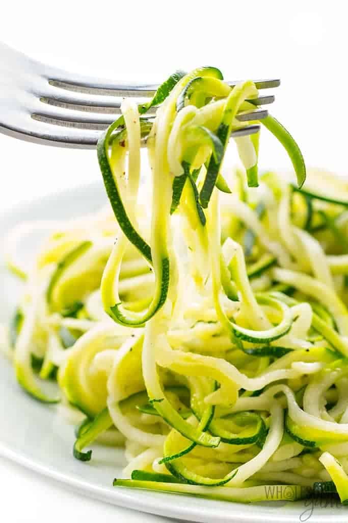Zucchini noodles recipe shown on a fork
