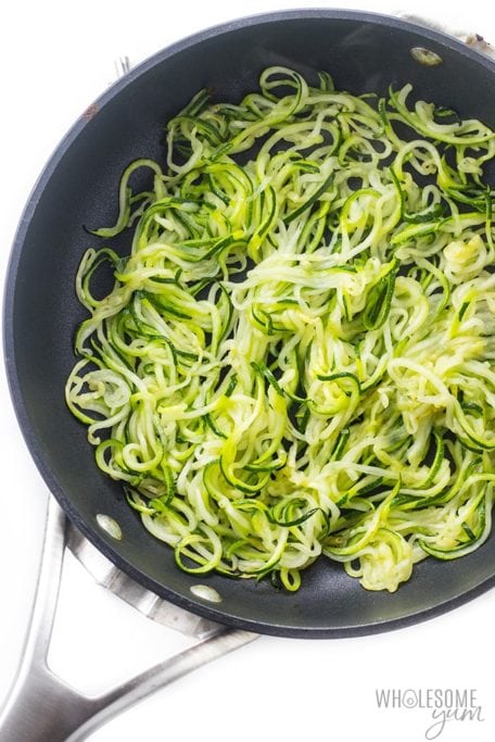 Sauteed zucchini noodles in a pan