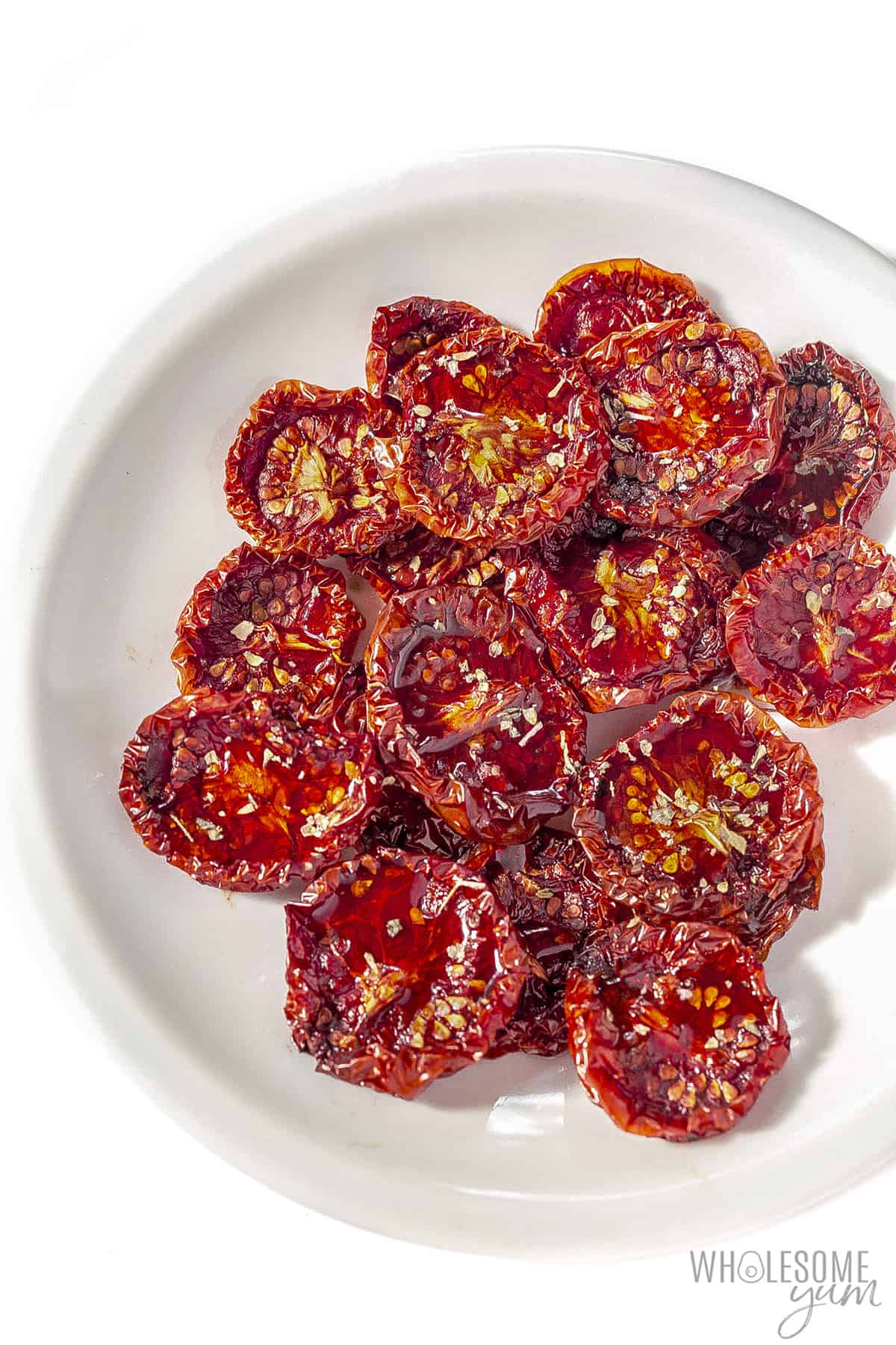 Oven dried tomatoes on a plate.