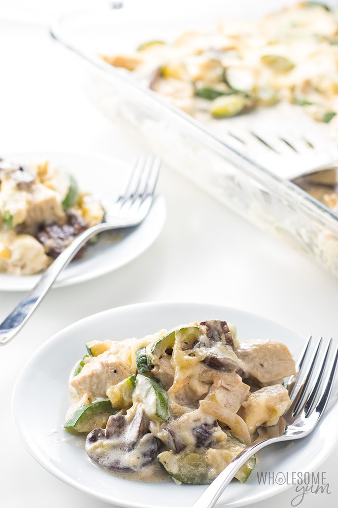 Low Carb Chicken Zucchini Casserole Recipe with Gruyere Cheese Sauce - This low carb chicken zucchini casserole recipe comes with a delicious gruyere cheese sauce - and an EASY method to avoid a watery zucchini casserole!