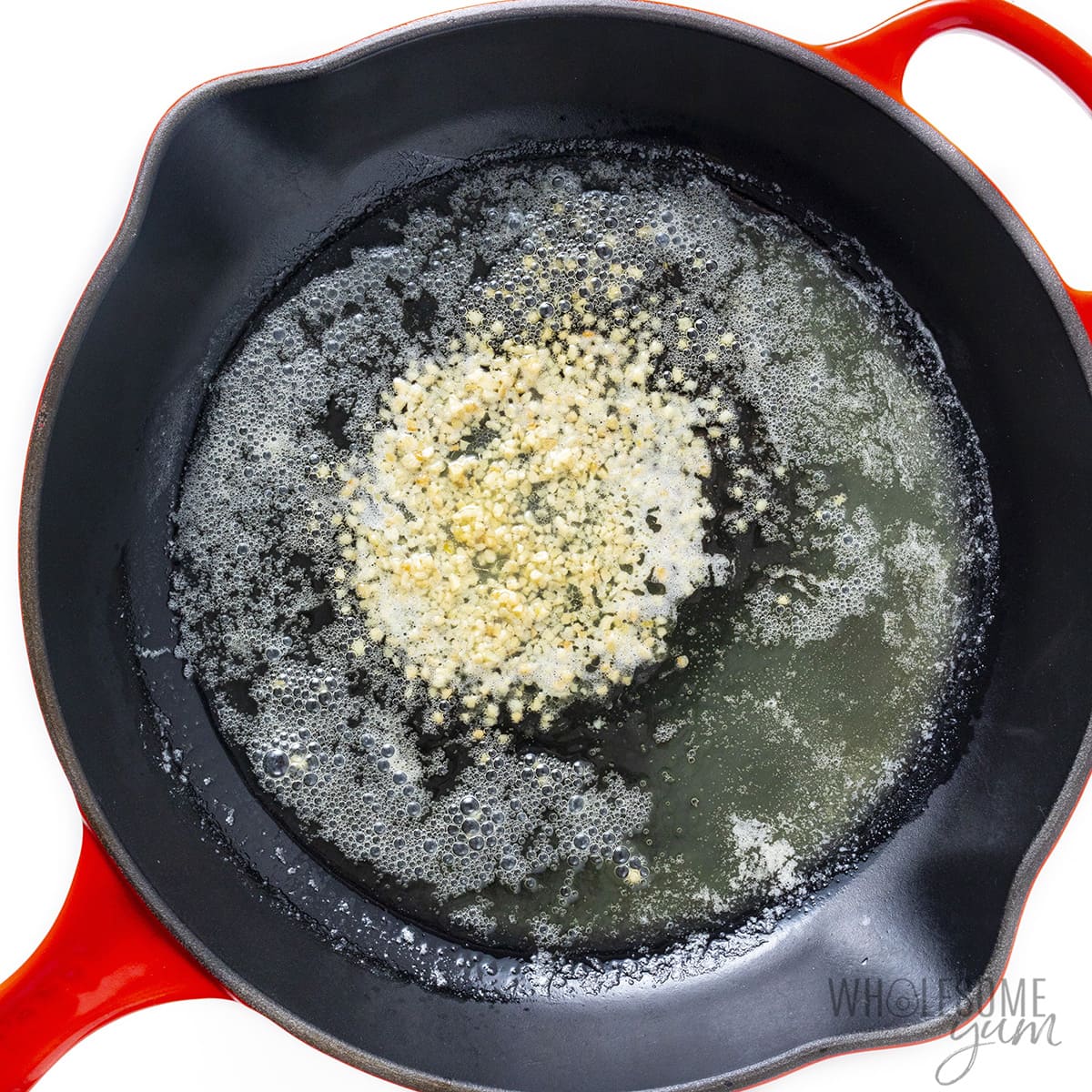 Garlic sauted in a skillet.