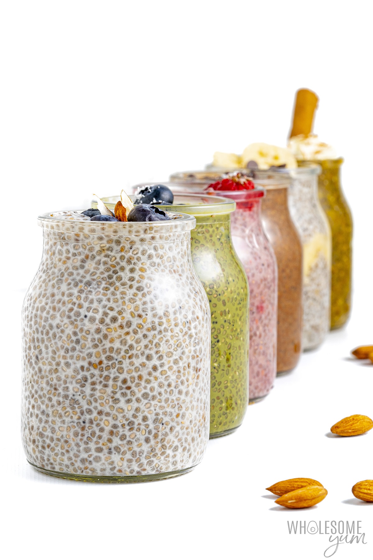 Chia pudding recipes lined up in jars.