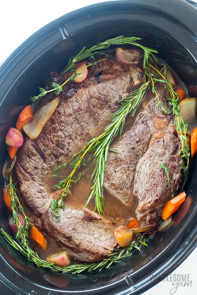 Keto Low Carb Pot Roast Slow Cooker Recipe - The BEST slow cooker pot roast! Includes how to choose the cut of meat for pot roast, prep tips, freezing pot roast, & an easy pot roast slow cooker recipe. And, this is a keto low carb pot roast, too.