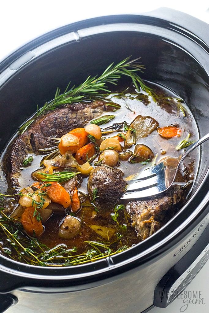 Keto Low Carb Pot Roast Slow Cooker Recipe - The BEST slow cooker pot roast! Includes how to choose the cut of meat for pot roast, prep tips, freezing pot roast, & an easy pot roast slow cooker recipe. And, this is a keto low carb pot roast, too.
