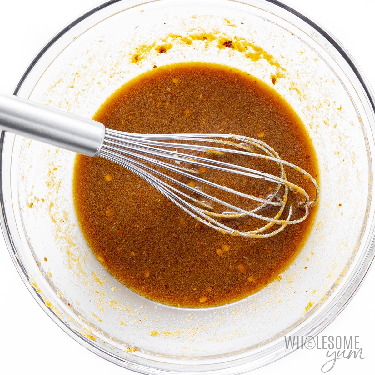 Sauce whisked in a bowl.