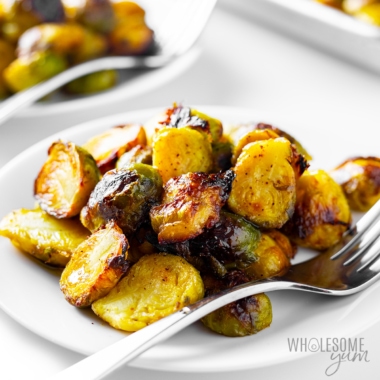 Roasted frozen brussel sprouts on a plate.