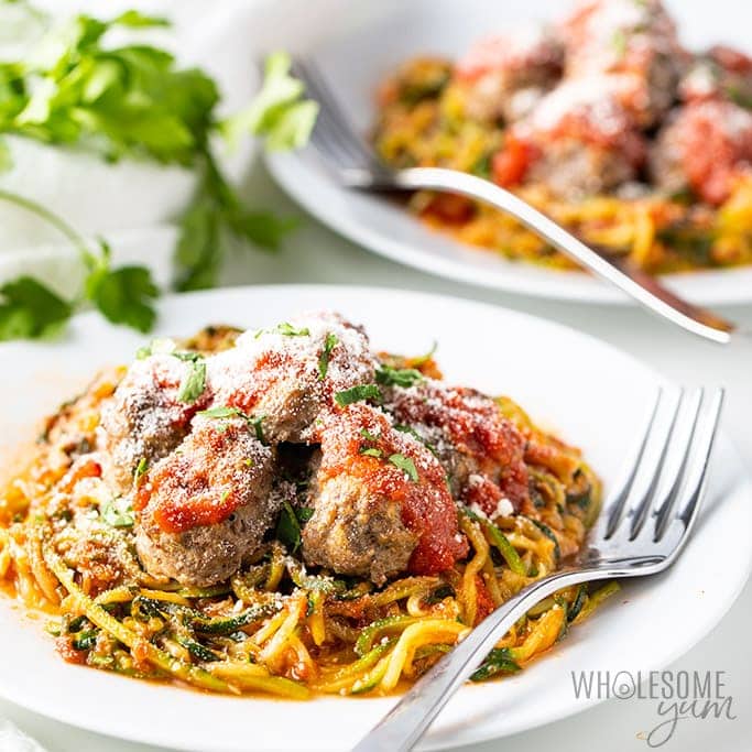 Side view of zucchini spaghetti and meatballs